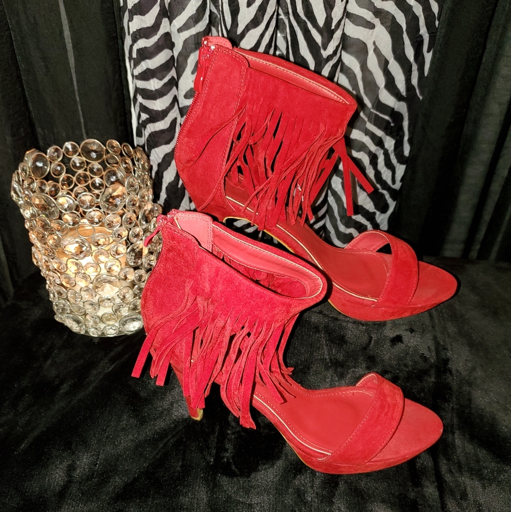 Red open toe heels with tassels